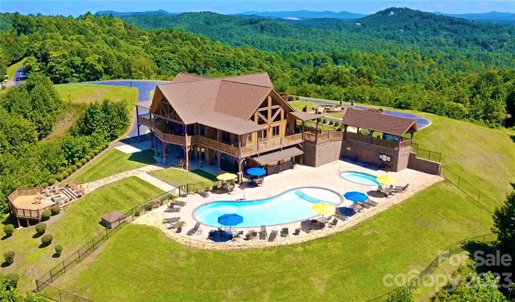 2032 Shadow Ridge Trail, Unit LOT G40 Lenoir, NC 28645 - Photo 19 of 25 a view of a swimming pool with a yard