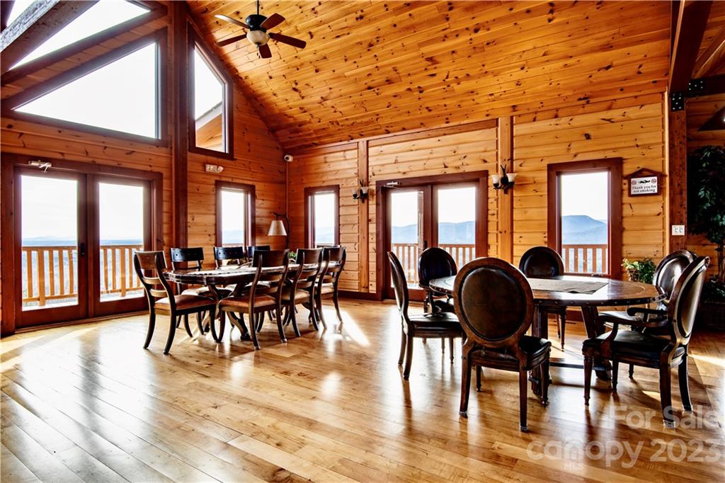 2032 Shadow Ridge Trail, Unit LOT G40 Lenoir, NC 28645 - Photo 22 of 25 a dining room with furniture garden potted plants and wooden floor