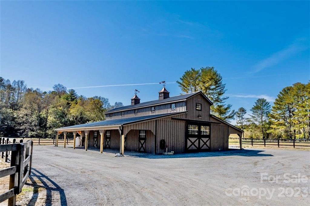 2032 Shadow Ridge Trail, Unit LOT G40 Lenoir, NC 28645 - Photo 6 of 25 a front view of a house with a yard