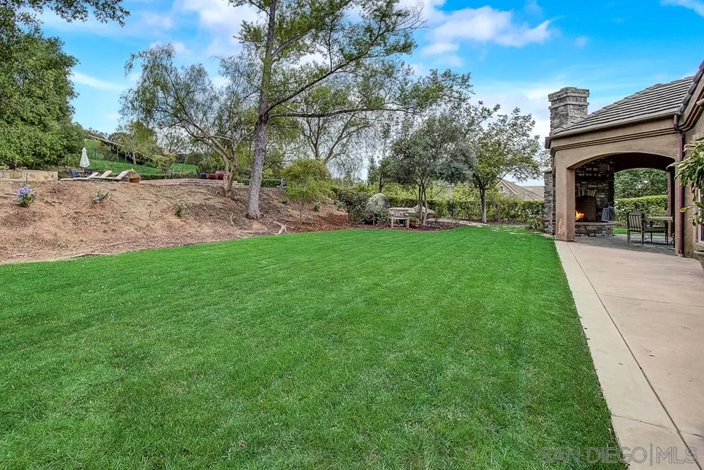 15165 Saddlebrook Lane Poway, CA 92064 - Photo 18 of 25 a view of a porch with a yard