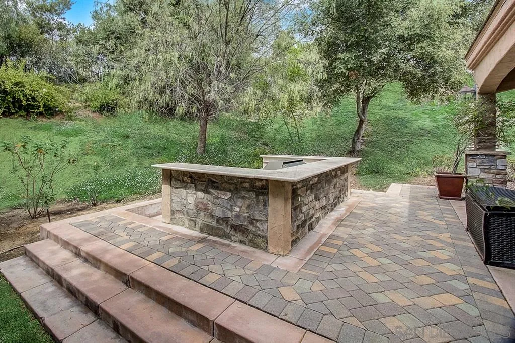 15165 Saddlebrook Lane Poway, CA 92064 - Photo 23 of 25 a view of a couches in the patio with a yard