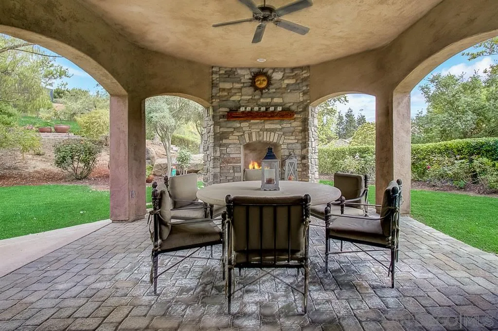 15165 Saddlebrook Lane Poway, CA 92064 - Photo 24 of 25 a living room with patio furniture and garden