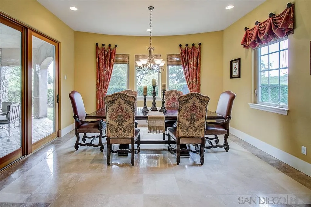 15165 Saddlebrook Lane Poway, CA 92064 - Photo 4 of 25 a view of a dining room with furniture window and outside view