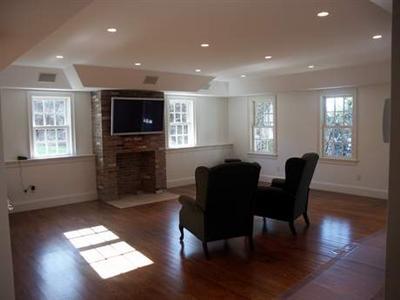 Undisclosed Address Barnstable, MA 02630 - Photo 12 of 13 a living room with furniture window and a flat screen tv