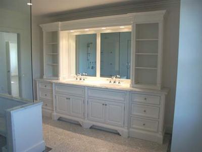 Undisclosed Address Barnstable, MA 02630 - Photo 10 of 13 a bathroom with a double vanity sink and mirror