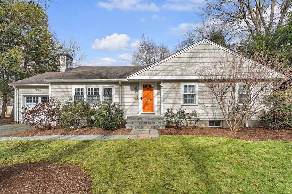a front view of house with yard