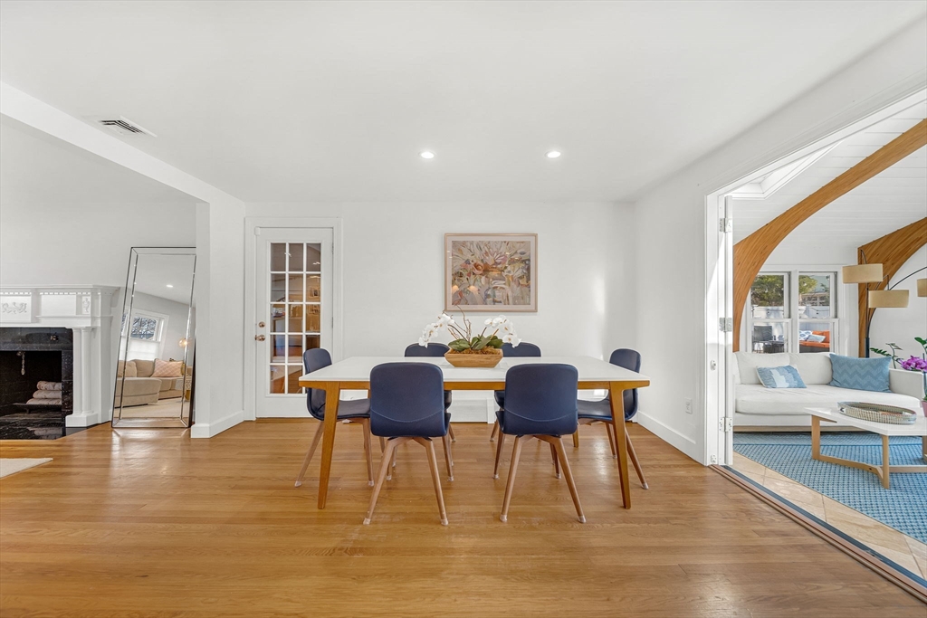 69 Donizetti Street Wellesley, MA 02482 - Photo 11 of 29 a view of a dining room with furniture and wooden floor