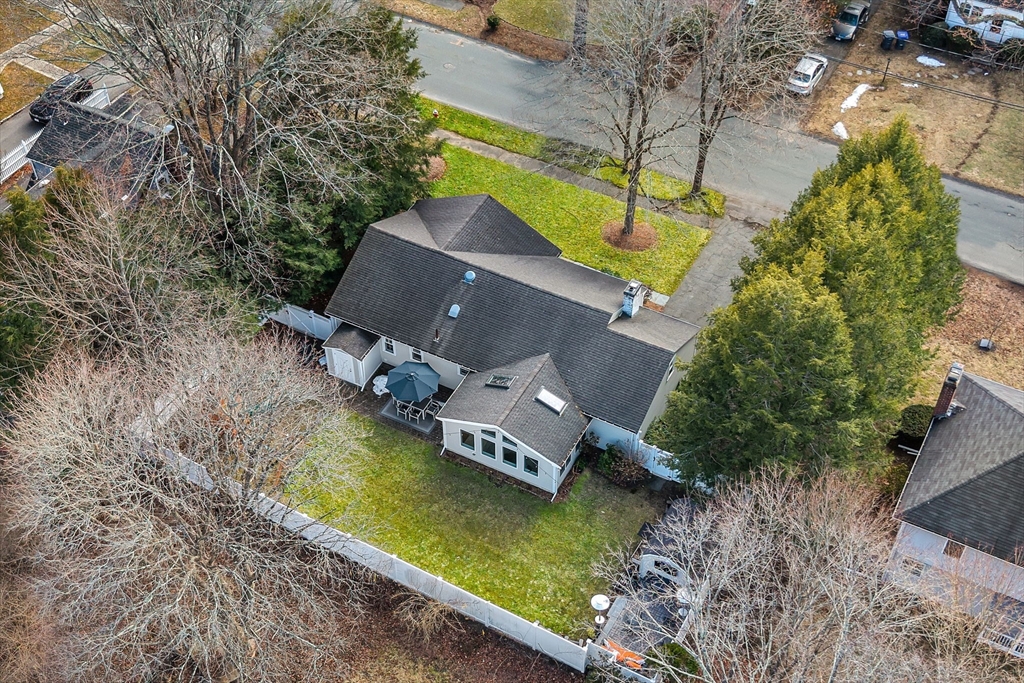 69 Donizetti Street Wellesley, MA 02482 - Photo 27 of 29 an aerial view of a house with a garden and swimming pool