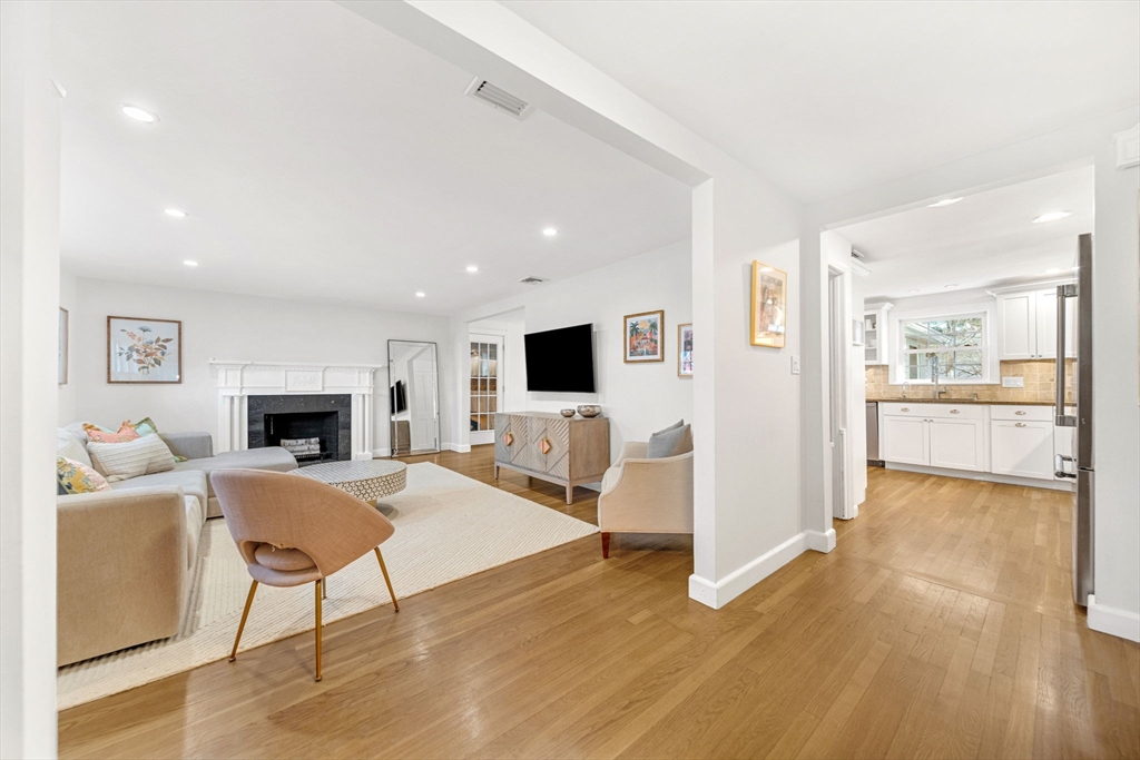 69 Donizetti Street Wellesley, MA 02482 - Photo 4 of 29 a living room with furniture and a flat screen tv