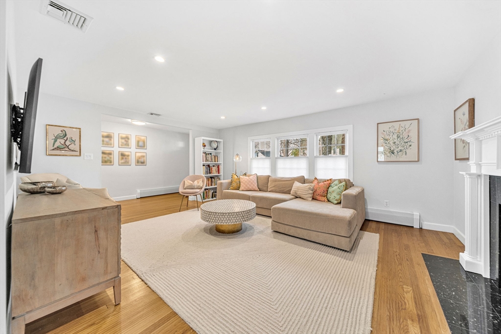 69 Donizetti Street Wellesley, MA 02482 - Photo 5 of 29 a living room with furniture and a table