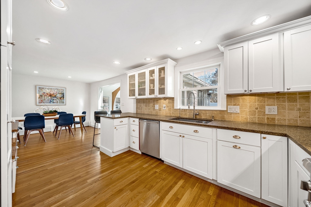 69 Donizetti Street Wellesley, MA 02482 - Photo 10 of 29 a kitchen with a sink and cabinets