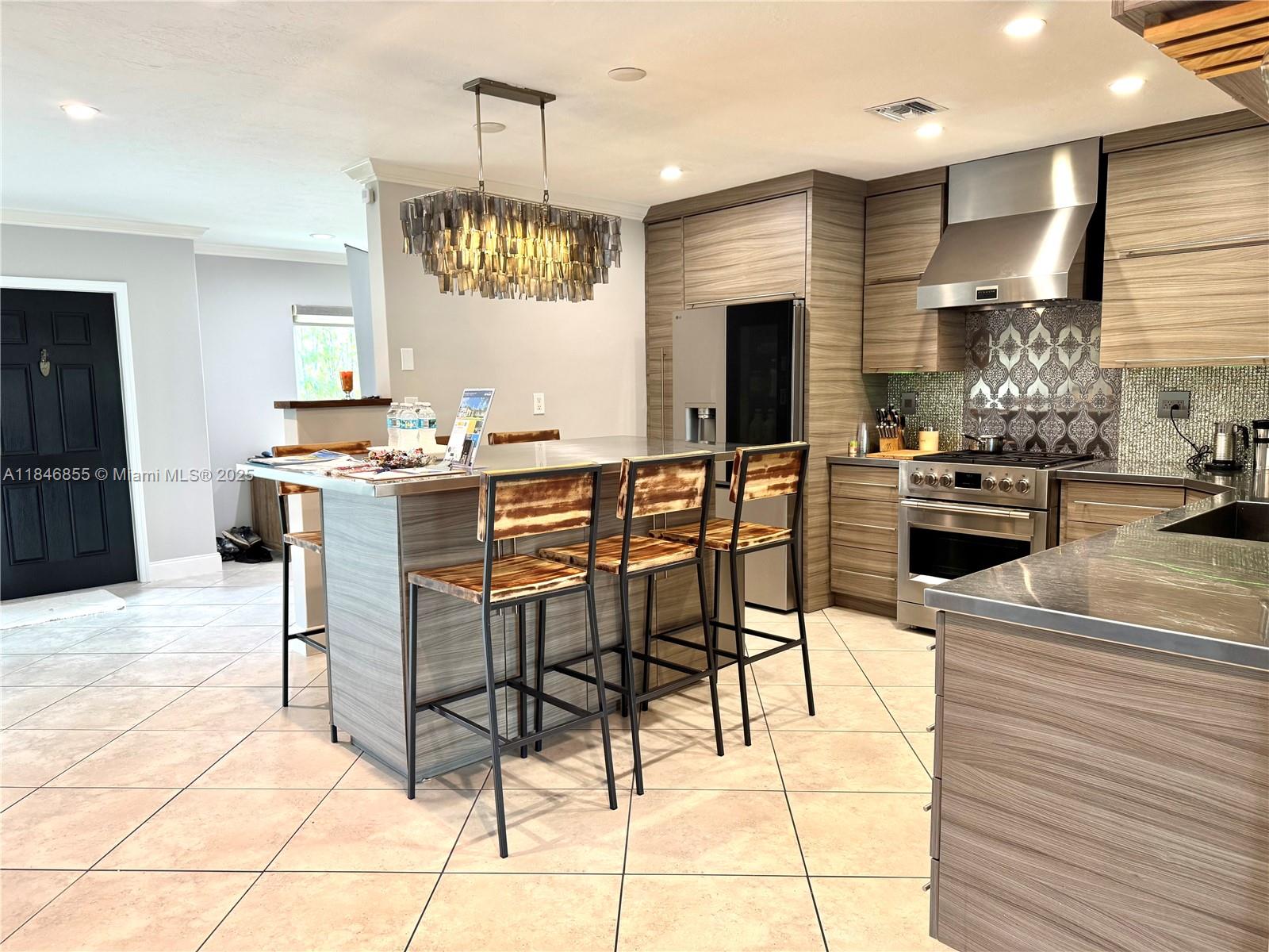 9385 Southwest 185th Street Cutler Bay, FL 33157 - Photo 16 of 27 a view of a dining room kitchen and a counter top space