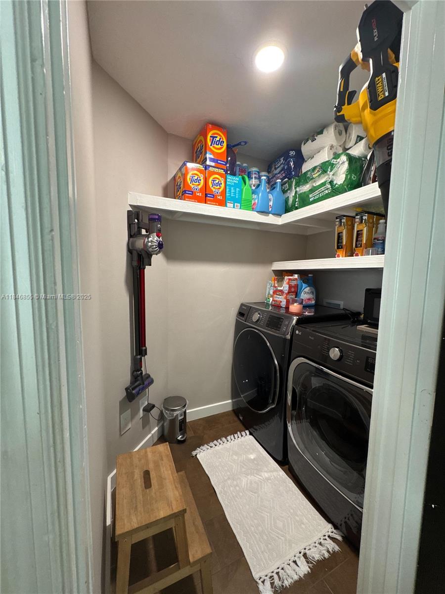 9385 Southwest 185th Street Cutler Bay, FL 33157 - Photo 17 of 27 a utility room with dryer and washer