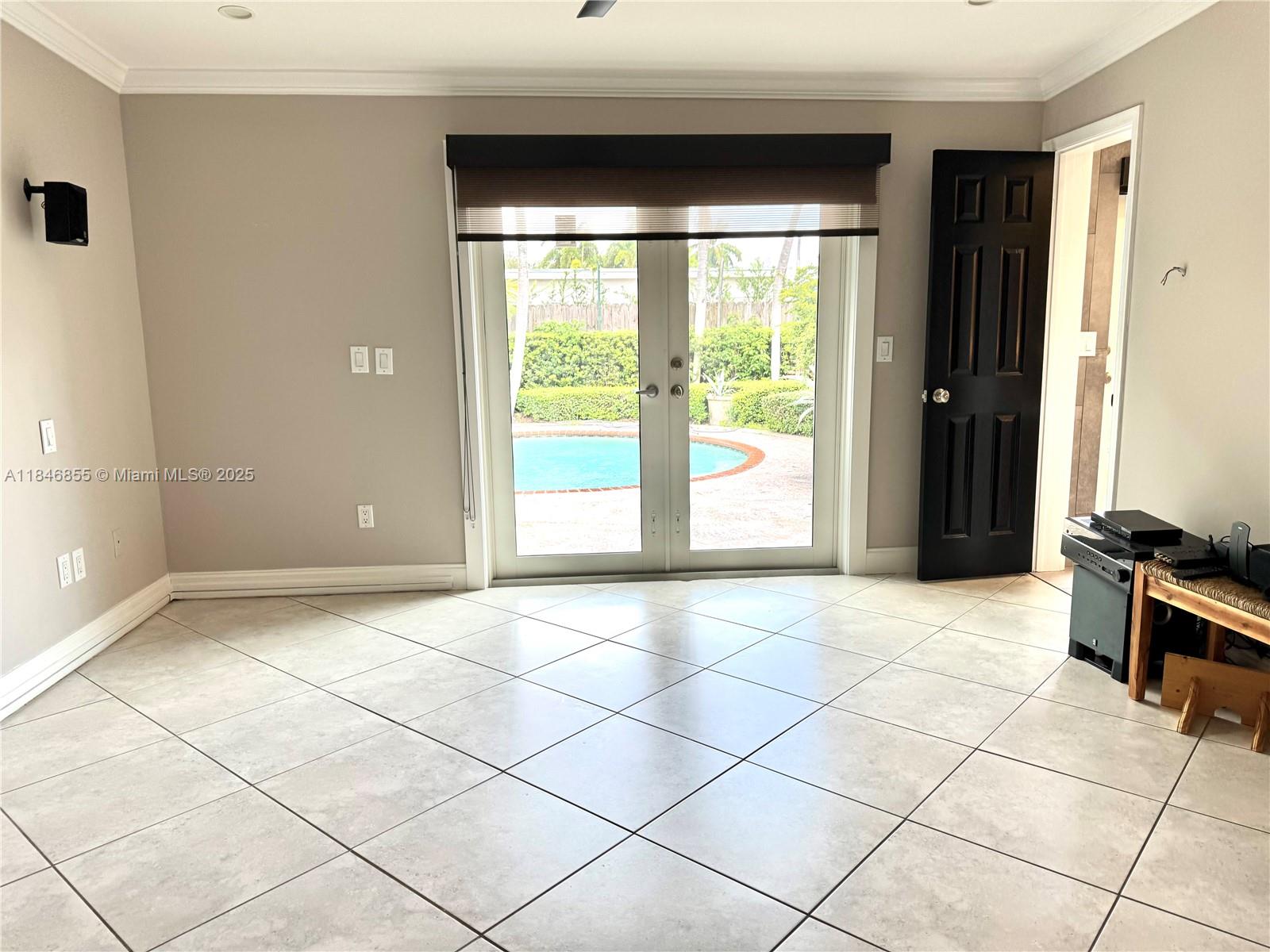 9385 Southwest 185th Street Cutler Bay, FL 33157 - Photo 23 of 27 a view of an empty room with a window