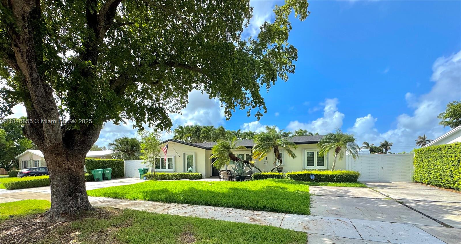 9385 Southwest 185th Street Cutler Bay, FL 33157 - Photo 3 of 27 a front view of a house with garden