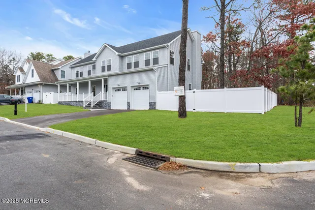 a view of a porch with wooden floor