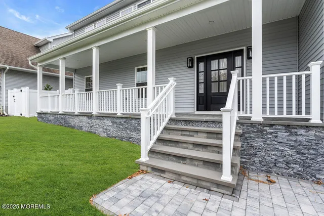 a view of an entryway with staircase