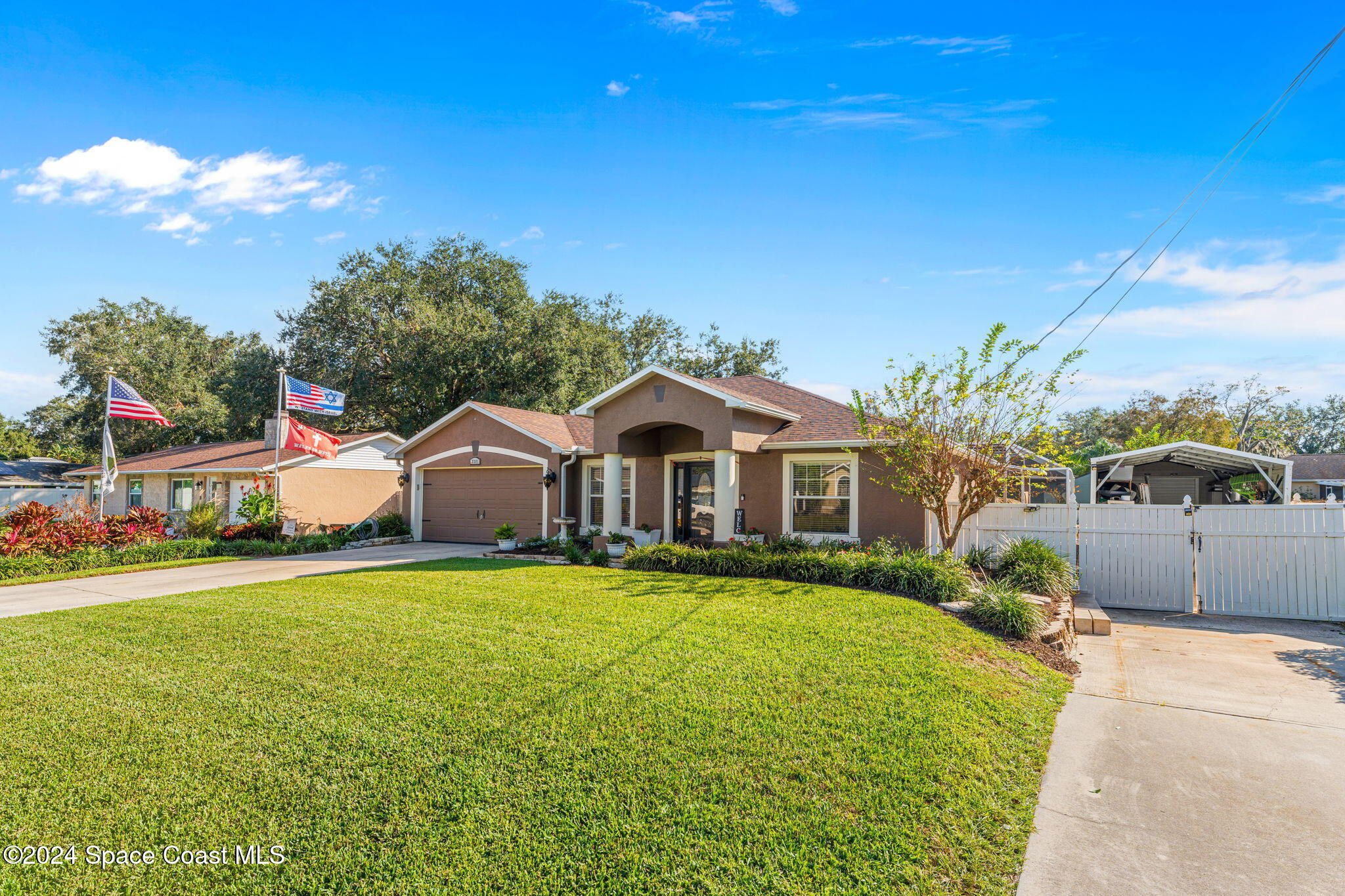 7325 Darien Road Cocoa, FL 32927 - Photo 9 of 55 Detached driveway to Detached Carport