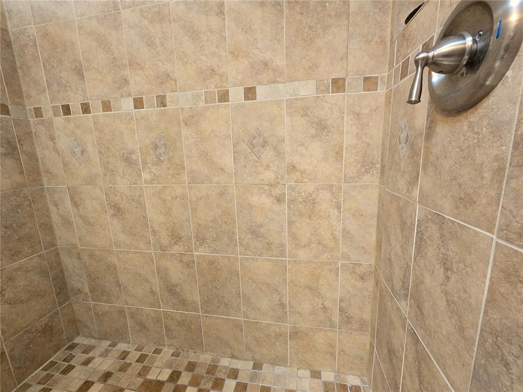 514 Brandon Avenue Clearwater, FL 33765 - Photo 18 of 67 a bathroom with a shower