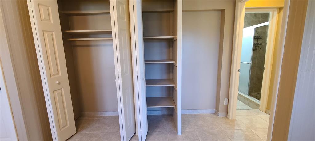 514 Brandon Avenue Clearwater, FL 33765 - Photo 33 of 67 a view of an empty walk in closet