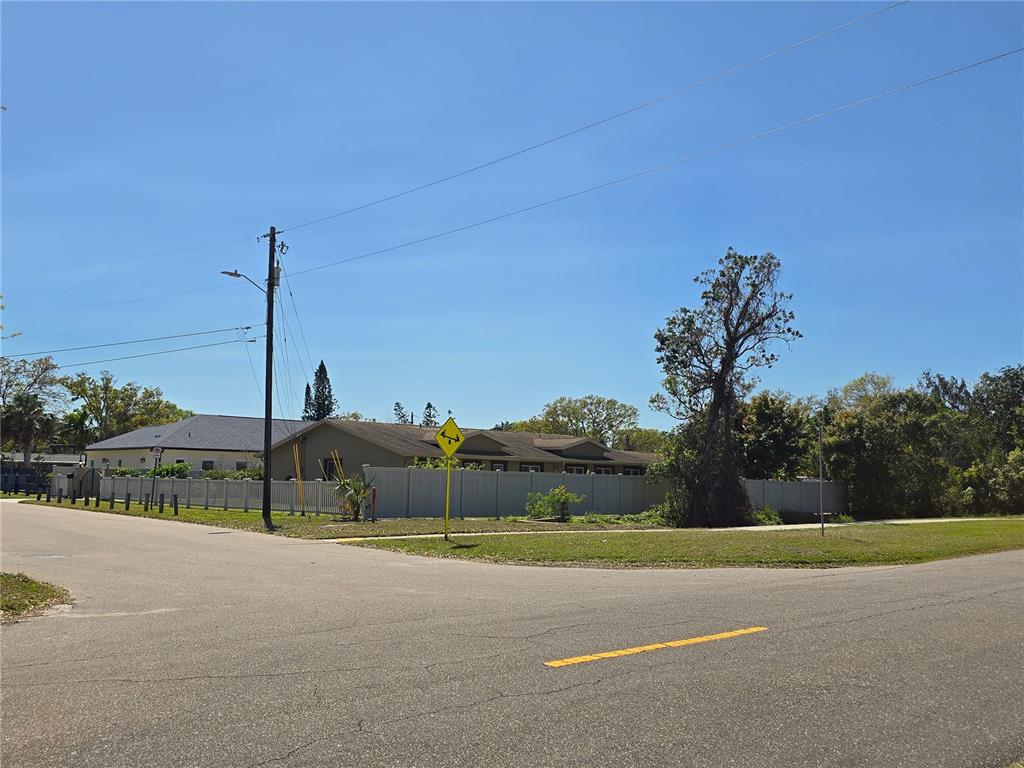514 Brandon Avenue Clearwater, FL 33765 - Photo 52 of 67 a view of a road with a yard