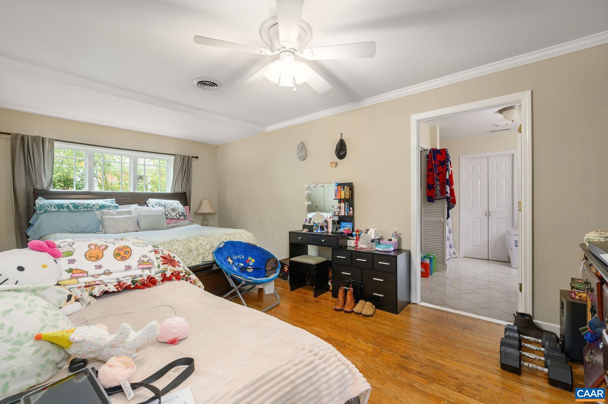 2806 Brookmere Road Charlottesville, VA 22901 - Photo 13 of 19 a bedroom with furniture and a large window