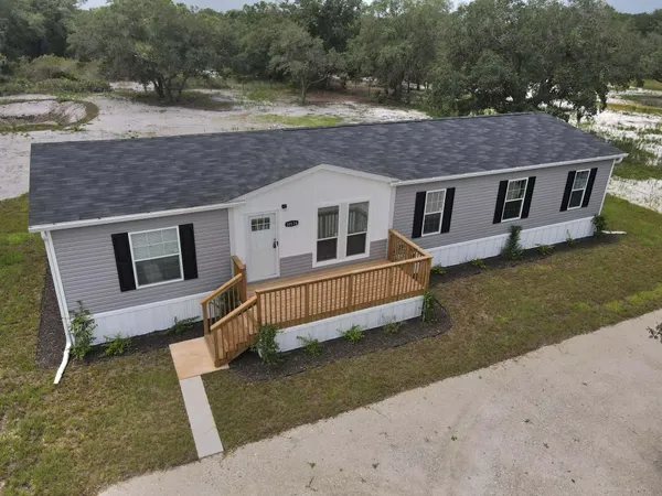 a front view of house with yard