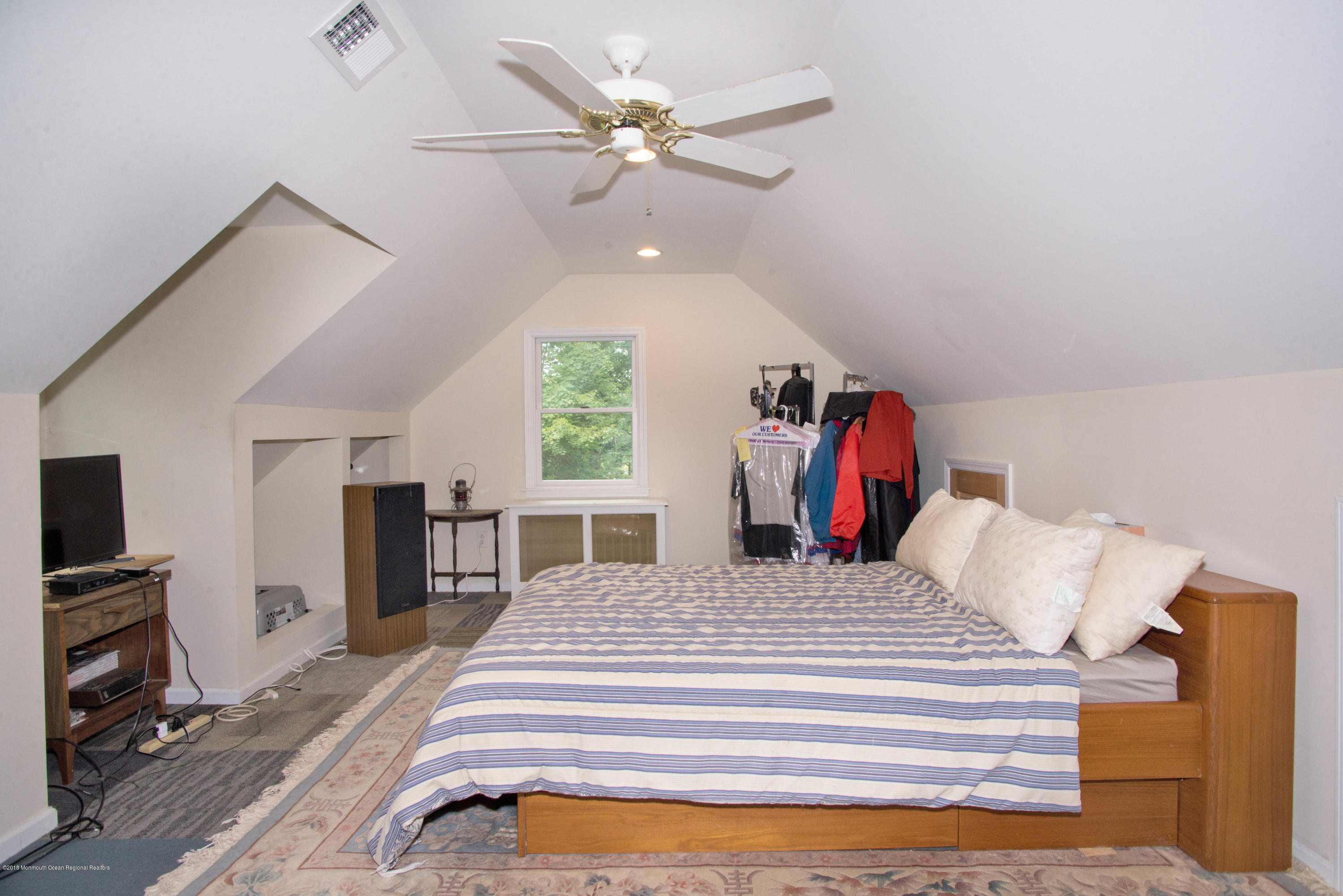 53 Fort Plains Road Howell, NJ 07731 - Photo 13 of 19 a bedroom with a bed and a flat screen tv