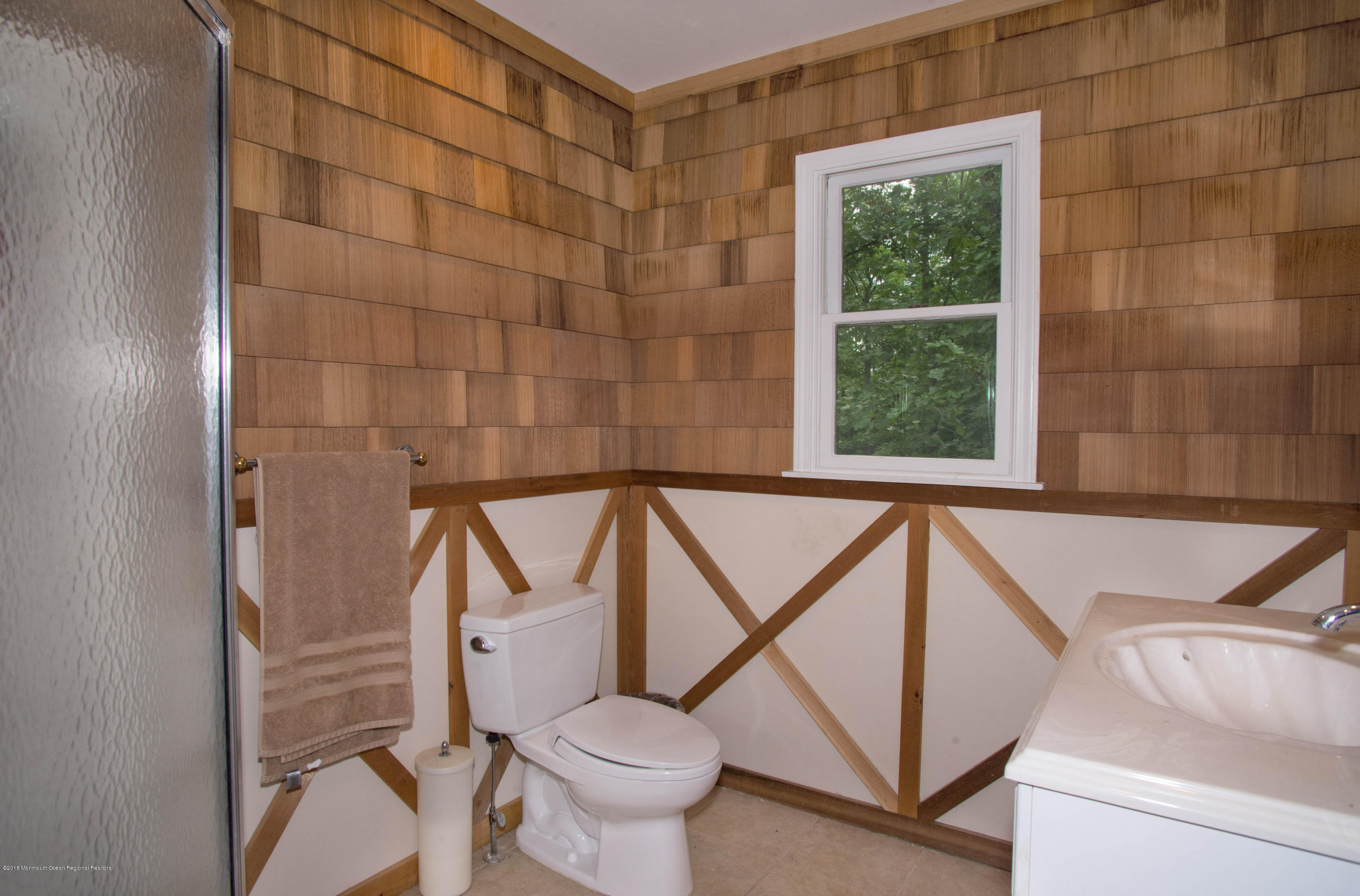 53 Fort Plains Road Howell, NJ 07731 - Photo 15 of 19 a bathroom with a toilet a sink and a shower