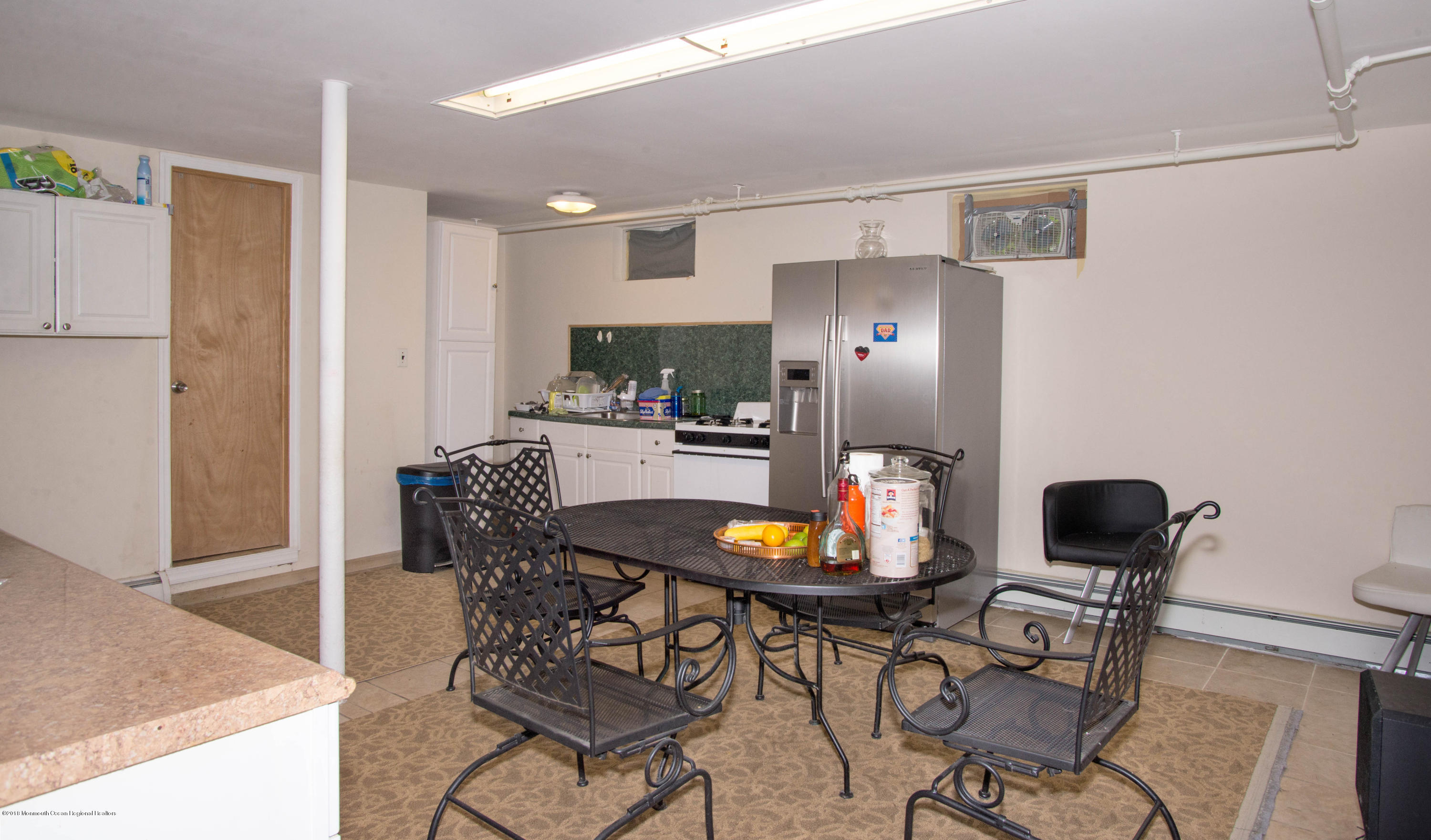 53 Fort Plains Road Howell, NJ 07731 - Photo 17 of 19 a view of a dining room with furniture and wooden floor