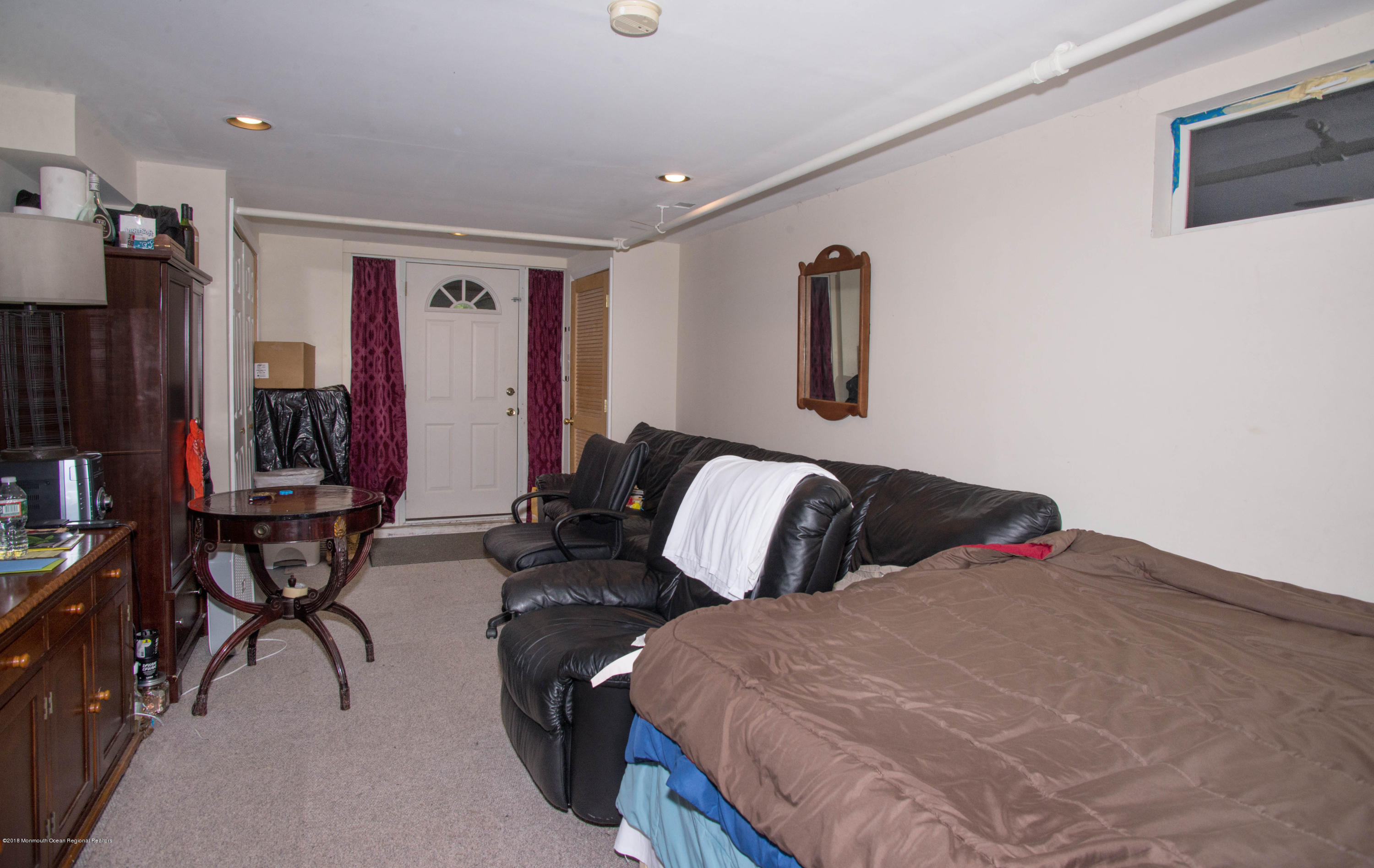 53 Fort Plains Road Howell, NJ 07731 - Photo 18 of 19 a bedroom with a bed and wooden floor