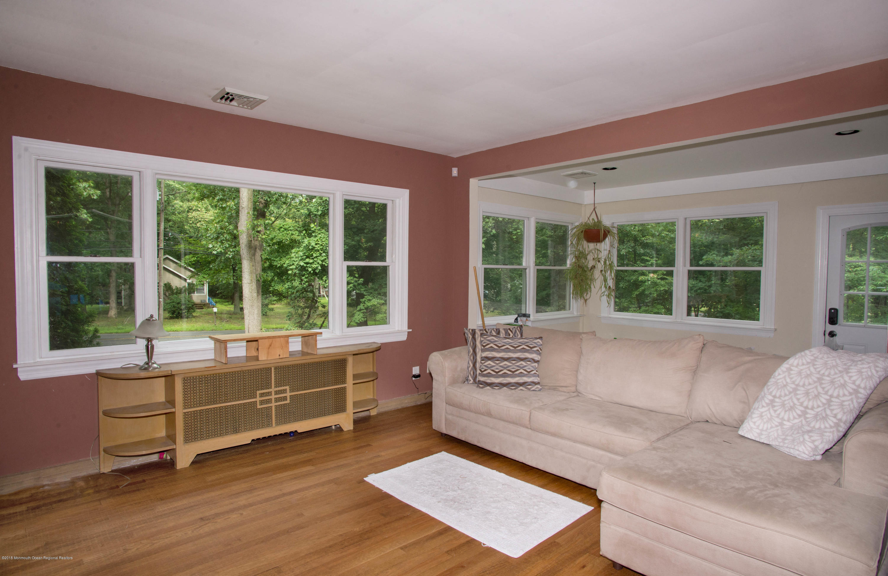 53 Fort Plains Road Howell, NJ 07731 - Photo 4 of 19 a living room with furniture and large windows