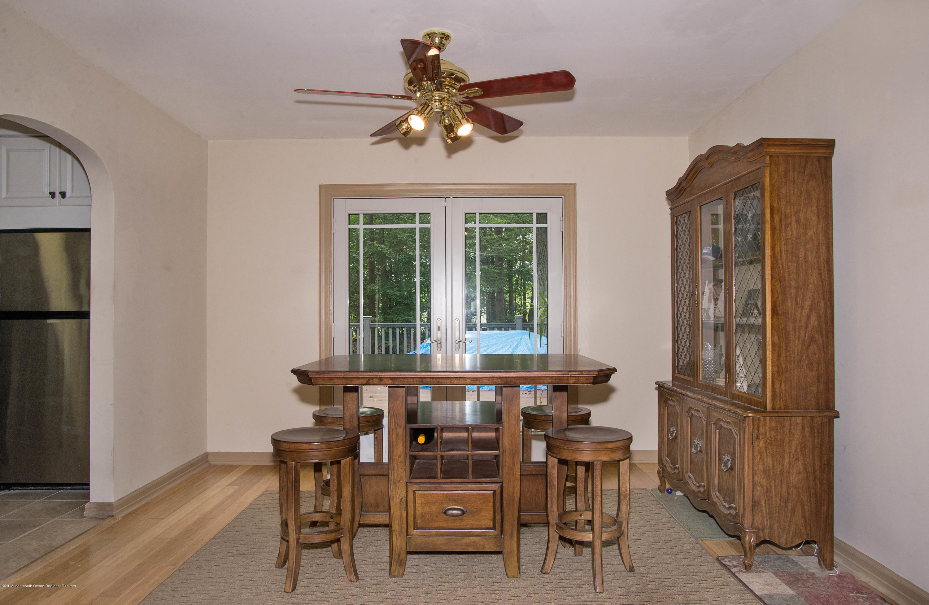 53 Fort Plains Road Howell, NJ 07731 - Photo 6 of 19 a view of a dining room with furniture and a chandelier