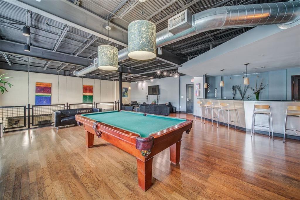 5300 Peachtree Road, Unit 2604 Atlanta, GA 30341 - Photo 7 of 39 a room with wooden floors and pool table