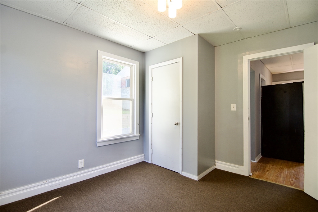 425 Taylor Street, Unit 1 Springfield, MA 01105 - Photo 22 of 25 an empty room with windows