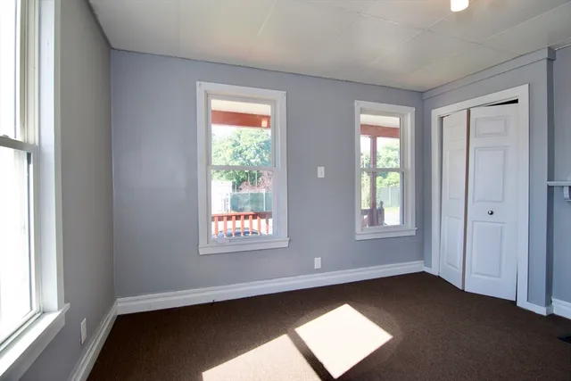 a view of an empty room and window