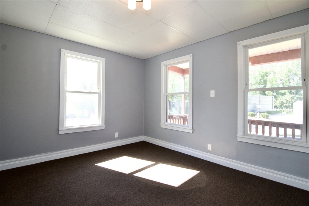 425 Taylor Street, Unit 1 Springfield, MA 01105 - Photo 7 of 25 a view of an empty room with a window