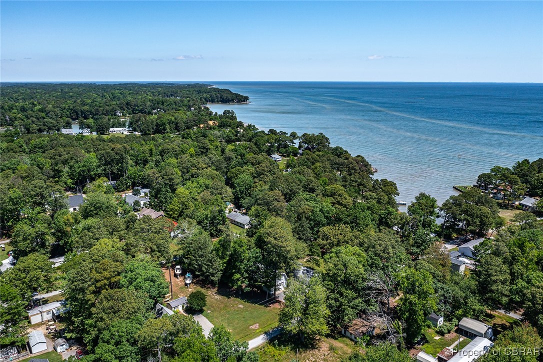 189 Virginia Road Reedville, VA 22539 - Photo 42 of 46 Bird's eye view of a nearby body of water and a heavily wooded area