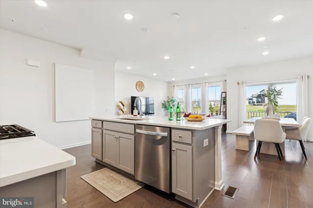 a kitchen with counter and sink