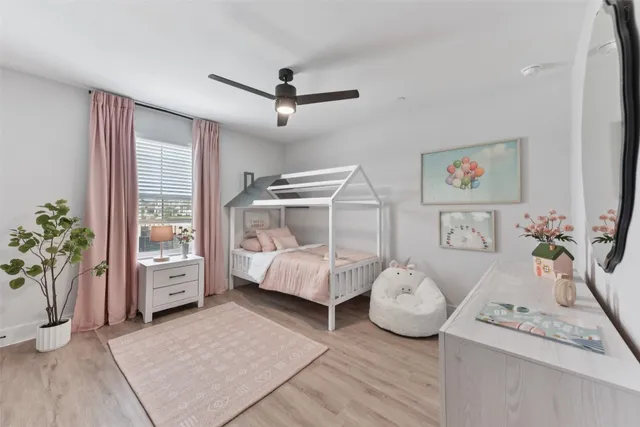 a hallway with table and couch