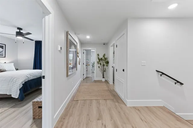 a bed room with a bed and dresser