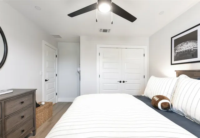 a view of a bedroom from a hallway