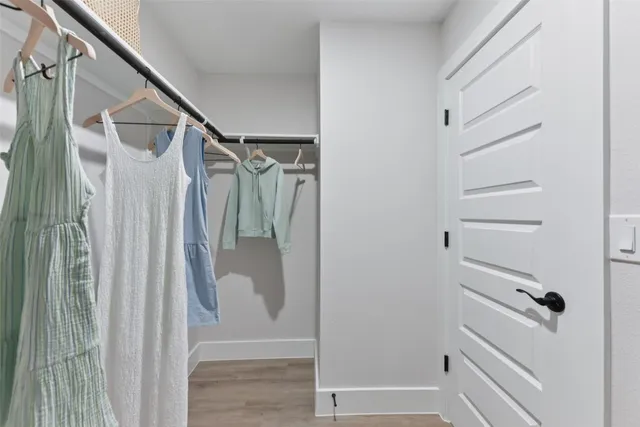 a kitchen with stainless steel appliances kitchen island granite countertop a sink and cabinets