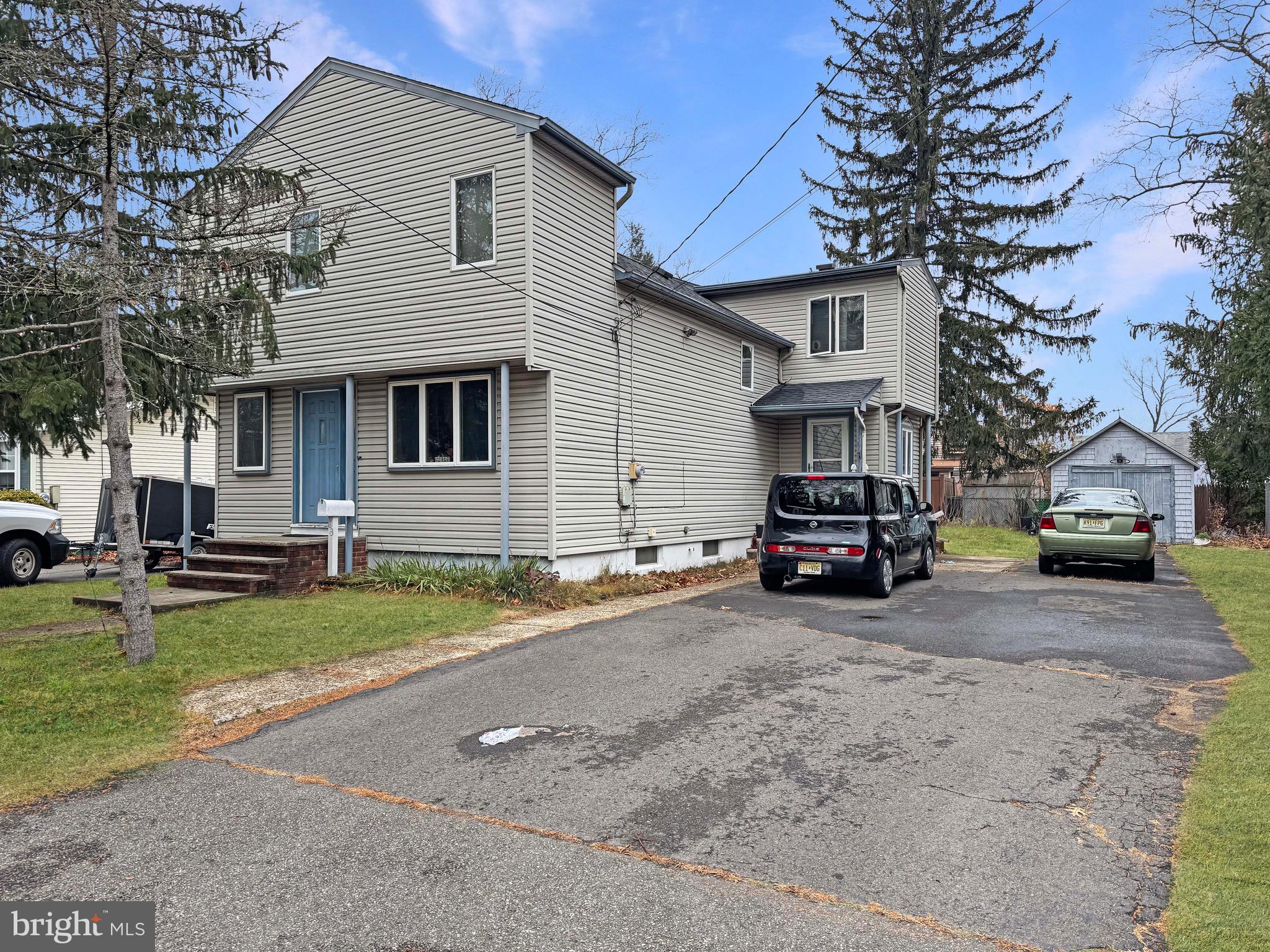 a car parked in front of a house