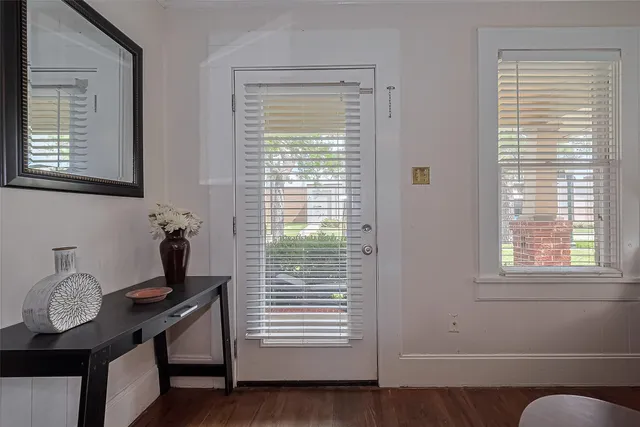 a view of a livingroom with furniture and window