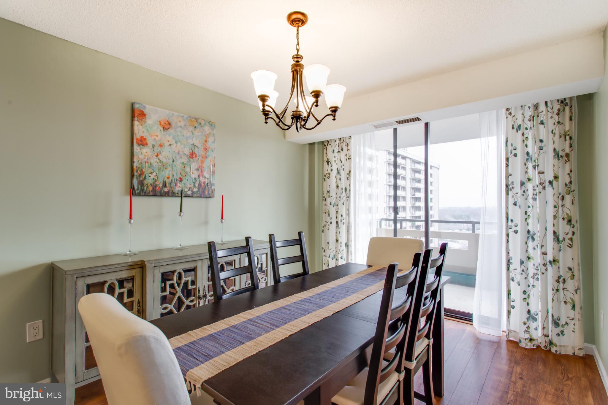 1808 Old Meadow Road, Unit 1012 McLean, VA 22102 - Photo 11 of 62 Bright dining space with scenic views.