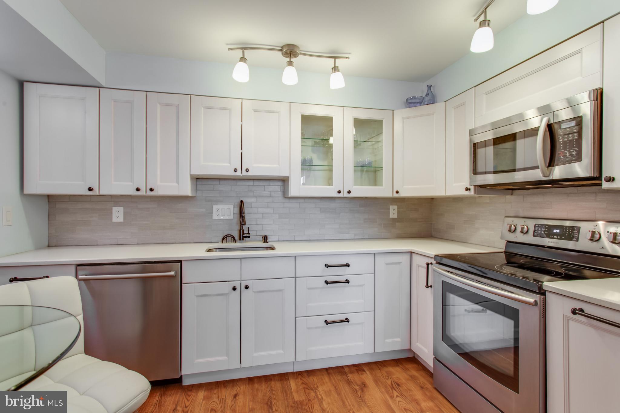 1808 Old Meadow Road, Unit 1012 McLean, VA 22102 - Photo 16 of 62 Modern kitchen with sleek cabinetry.