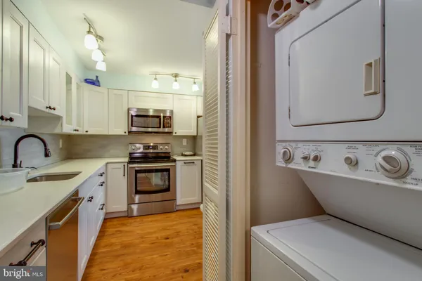 a bathroom with a tub and shower