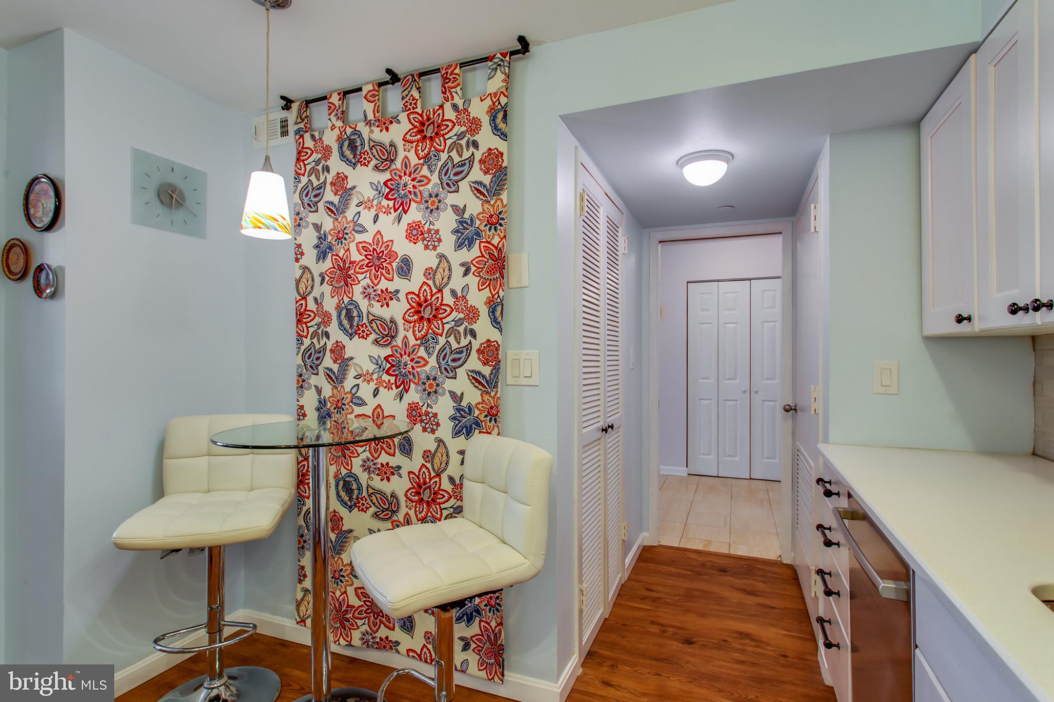 1808 Old Meadow Road, Unit 1012 McLean, VA 22102 - Photo 23 of 62 Charming kitchen nook with vibrant decor.