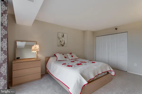 a bathroom with a shower curtain and a shower curtain
